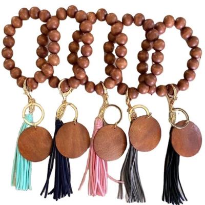 China Wholesale Unisex Wooden Bead Key Chain For Women Men Bracelet Multicolor Tassel Key Chain for sale