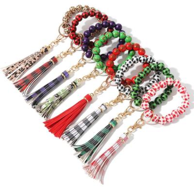 China Unisex Fashion Leather Beaded Multicolor Wooden Beads Bracelet Tassel Key Chain for sale