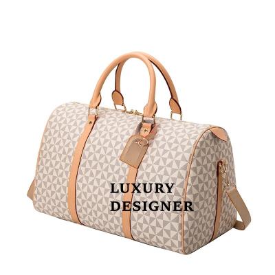 China 2022 Luxury High Quality Duffel Travel Bag Famous Brands Designer Handbags Leather Duffle Bag Vintage Luggage Bags for Woman and Man for sale