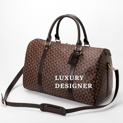 China Outdoor Activity Luggage Bags 2022 Large Capacity Leather Duffle Bag Designer Handbags Famous Brands Handbags For Women Luxury Duffel Travel Bag for sale