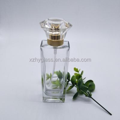 China New Customized 50ml /100ml Empty Personal Care Clear Spray Glass Perfume Bottles With Gold Cap for sale