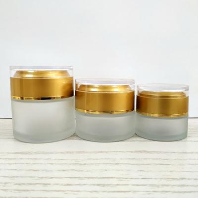 China Skin Care Round Gel Glass Cream Jar 20g 30g 50g Empty Cosmetic Cream Jar With Cap Face Cosmetic Glass Cream Jar With Double Wall Gold Cap for sale