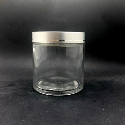 China Personal Care 100 Gram Big Volume Glass Jars Glass Bottle Making for sale