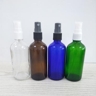 China Personal care whosale 50ml 100ml boston round spray glass bottle with pump screw cap for eaaential oil for sale