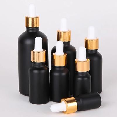 China Xuzhou Factory Personal Care 5 ml 10ml 20ml 30ml 50ml 100ml Boston Round E Glass Dropper Bottle Amber Essential Oil Liquid Bottle for sale