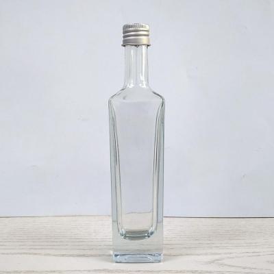 China Beverage Screen Printing Decoration Empty Liquor 50ml Glass Bottle With Screw Cap And Label Printing for sale