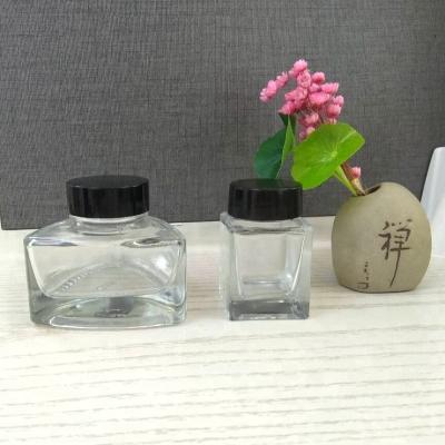 China 25ml 50ml ink pen ink glass bottle with plastic lids in stock for sale