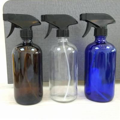 China Personal Care 16 Ounce 500ml Clear Blue Amber Boston Round Glass Bottle With Trigger for sale