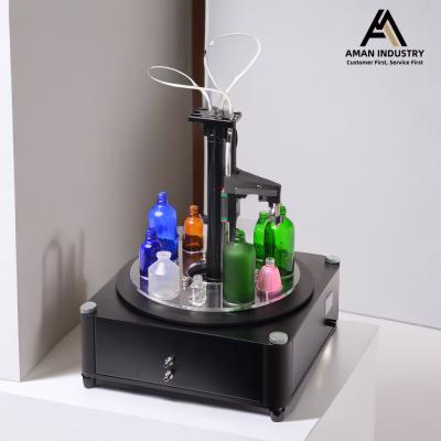 中国 Cosmetic Liquid Small Perfume Bottle Filling Machine, Round Bottle Filling Line 販売のため