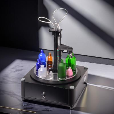 China Small electric filling machine manual 10ml bottle filler perfume filling machine en venta