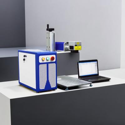 China fiber laser marking machine 10w 20w silver gold inside ring laser marking machine en venta