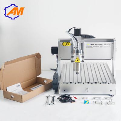 China cnc engraving machine AMAN3040 3d metal engraving machine Cnc wood craft engraving machine 3040 4axis for small business for sale