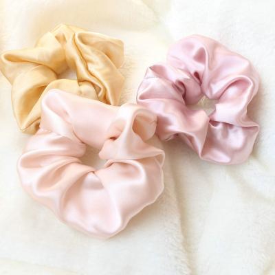 China 100% European and American style mulberry silk hair scrunchies for sleep wear good for hair and skin hair flower for sale