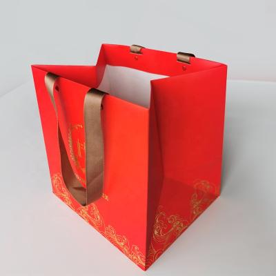 China Luxury Recycled Materials Zhishang Ribbon Handle Boutique Shopping Packaging Customized Printed Tote Paper Gift Bags With Euro Logo for sale