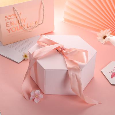 China Recycled Materials Rose Luxury Gift Box Folder Heart Shaped Gift Box for Essential Oil and Nail Polish Oil for sale