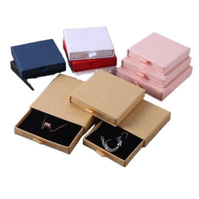 China Handmade Printed Luxury Outdoor Black Foil Stamping Embossing Clothes Packaging Boxes Gift Custom Logo for sale