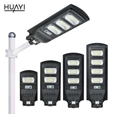 China HUAYI Outdoor Lighting 30w 60w 90w 120w Waterproof IP65 Outdoor Shine Integrated All In One Solar LED Street Light for sale