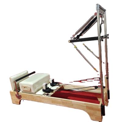 China Professional Solid Wood Multifunction Reformer Trapeze Equipment Pilates Reformer Equipment for sale