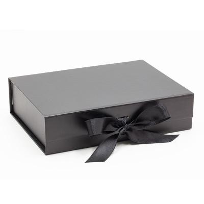 China Recycled Materials Wholesale Instant Closed Premium Black Rigid Magnetic Folding Gift Box With Ribbon for sale