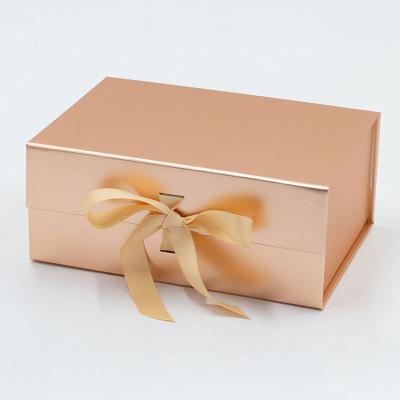 China Recycled Materials Fancy Mounted Gold Color Art Magnetic Folding Paper Flat Luxury Gift Boxes With Ribbon for sale