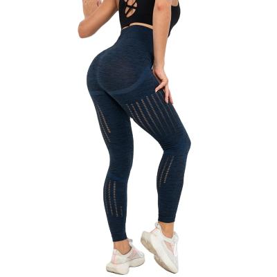 China Cavity Breathable Sexy Female Sports Leggings Custom Wholesale Women Workout Gym Tights for sale