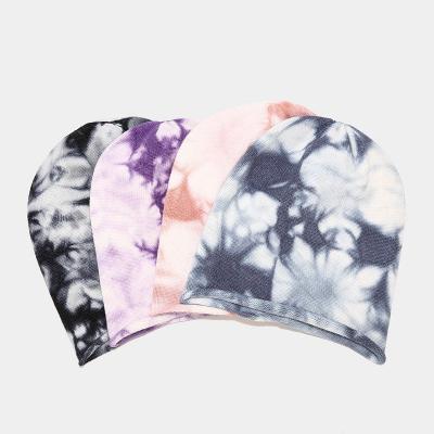 China New COMMONS Tie Dye Knitted Hats For Autumn And Winter Outdoor Windproof Ear-protection Ear-protection Hats Winter Acrylic Knitted Hat for sale