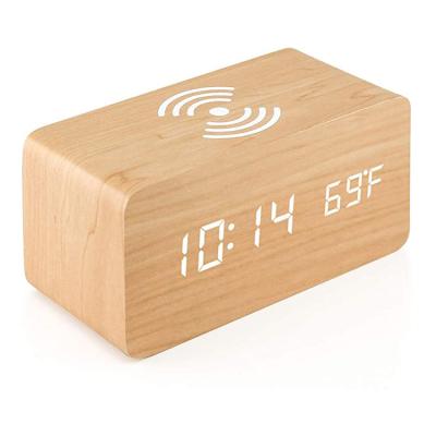 China Office Home Radio Bedroom Sound Control Function Charging Wooden LED Digital Alarm Clock for sale