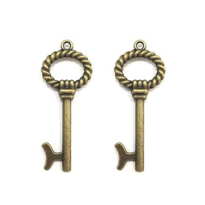 China CLASSIC High Quality Vintage Metal Alloy Key Bead Type Bronze Charm and Decorative Style Pendant Custom Medium Size for sale