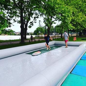 China High Quality Outdoor Large Inflatable Skimboard Swimming Pool Lane Water Entertainment PVC Skim Board Inflatable Floating Pool For Adults for sale