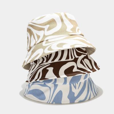 China Fashionable new image zebra pattern light color printing zebra bucket hat retro female fishermen bucket hats for sale