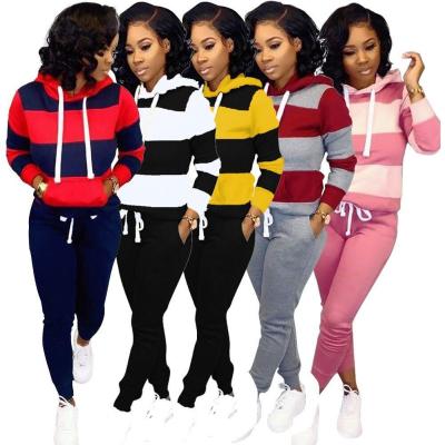 China 2021 Hot Sale Anti-Wrinkle Women Two Piece Set Clothing Striped Hooded Quilted Sweatshirt And Pants Suit for sale