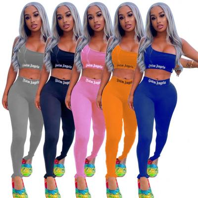 China Hot Selling QUICK DRY Printed Sports Suit 2pcs Sexy Two Piece Skinny Overalls And Skinny Loose Casual Long Pants Women One Shoulder Rompers One Piece for sale