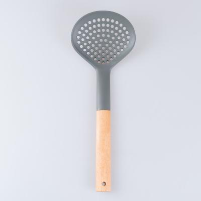 China Traditional Cooking Tools Kitchen Utensils Kitchenware Soft Silicone With Wooden Handles Hot Selling for sale