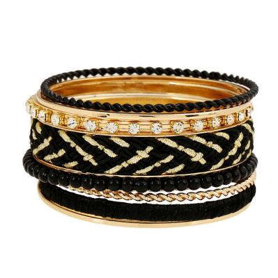 China Latest design gold iron bangle girls gold bangles fashion gold plated metal wire wholesale silk bangles for sale