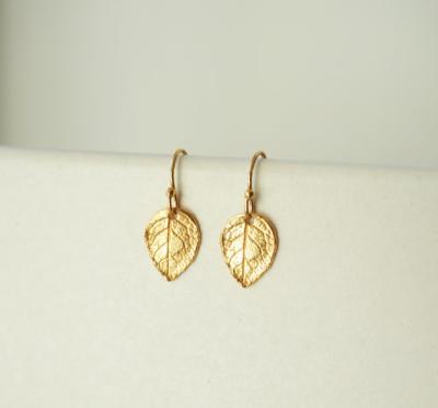 China Gold Leaf Earrings Fancy Design Fashion Alloy Leaf Dubai Gold Hanging Cute Earrings Tops Design for sale