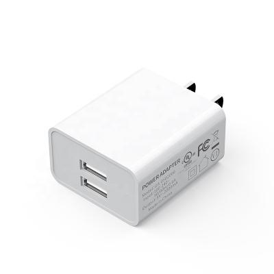 China Fashion Suitable for USA Wholesale and Retail U L FCC Certificated Dual Ports USB 5V 2A Portable Wall Charger Adapter For Cell Phones for sale