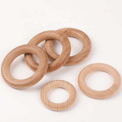 China Europe OEM Best Selling Polished Natural Log Ring Unfinished Wood Craft Ring For Baby Teether for sale