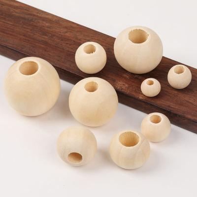 China Decoration or DIY / For Jewelry Making Natural Baby Teething 20mm Beads Loose Wood Beads Crafts Suitable For DIY Jewelry Making for sale