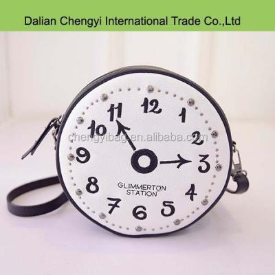 China Popular TOTE BAG Embroidery Clock Shaped Novelty Women PU Sling Bag for sale