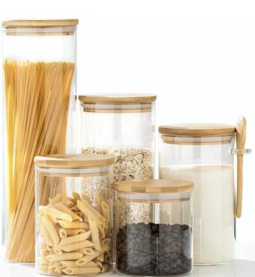 China Factory Directly Wholesale Minimalist Glass Storage Food Jar Small With Bamboo Wooden Lid for sale