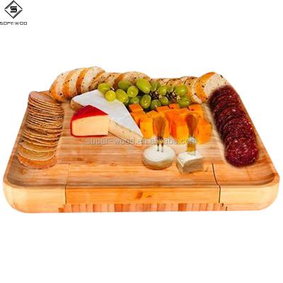 China Sustainable Bamboo Cheese Cutting Board With Cutlery Tray , Cheese Board With Knives Set Natural Cutting Plates for sale