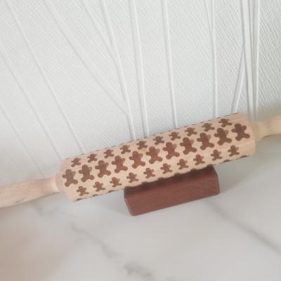 China Sustainable Pin Fondant Engraved Carved Wood Non-Stick Bakeware Amazon Christmas Rolling Pin Pastry Tools for sale