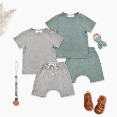 China Hot Sale Organic Chiffon Kids Clothing Short Sets Short Sleeve Shorts Baby Clothes 2 Pcs Teams Clothing Sets for sale