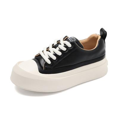 China New fashion style big toe shoes genuine leather white ladies lace up flat panel casual shoes walking shoes for sale