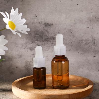 China Cosmetic Customized Empty Amber Refillable Hair Oil Plastic Eye Oil Plastic Facial Oil Bottle for sale