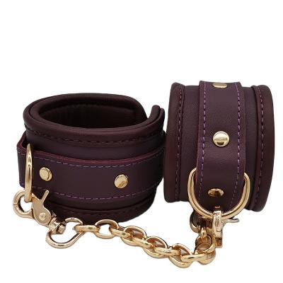 China High Quality and Safe Adult Sex Pleasure Sexy Purple Leather Adult Game Props Handcuffs for Couples Sex Games for sale