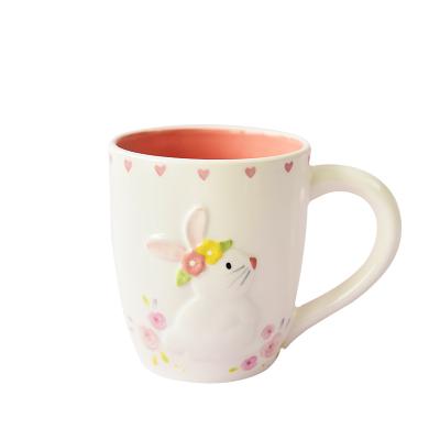 China Sustainable bunny with yellow pink followers embossing homemade ceramic coffee mugs for sale