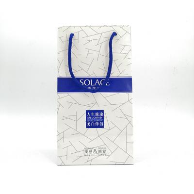 China Wholesale Recyclable Custom Printed Logo Paper Packaging Bag With Rope Handles Cosmetic Paper Bags for sale