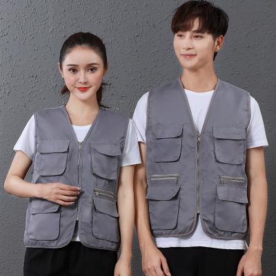 China Multi Pockets Cargo Fisherman Vest Cartoon Logo Breathable Vest For Fishing Journalist Hiking Photography Camping Safari Custom Vest for sale