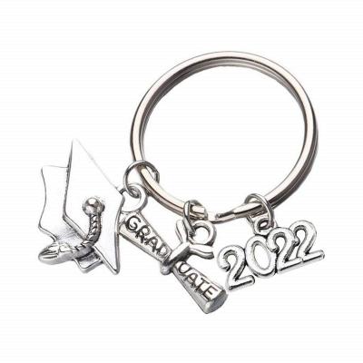 China 2022 Fashion Trendy Student Graduation Keychain Stainless Steel Doctor Hat Keychain Silver Littering For Women Men for sale